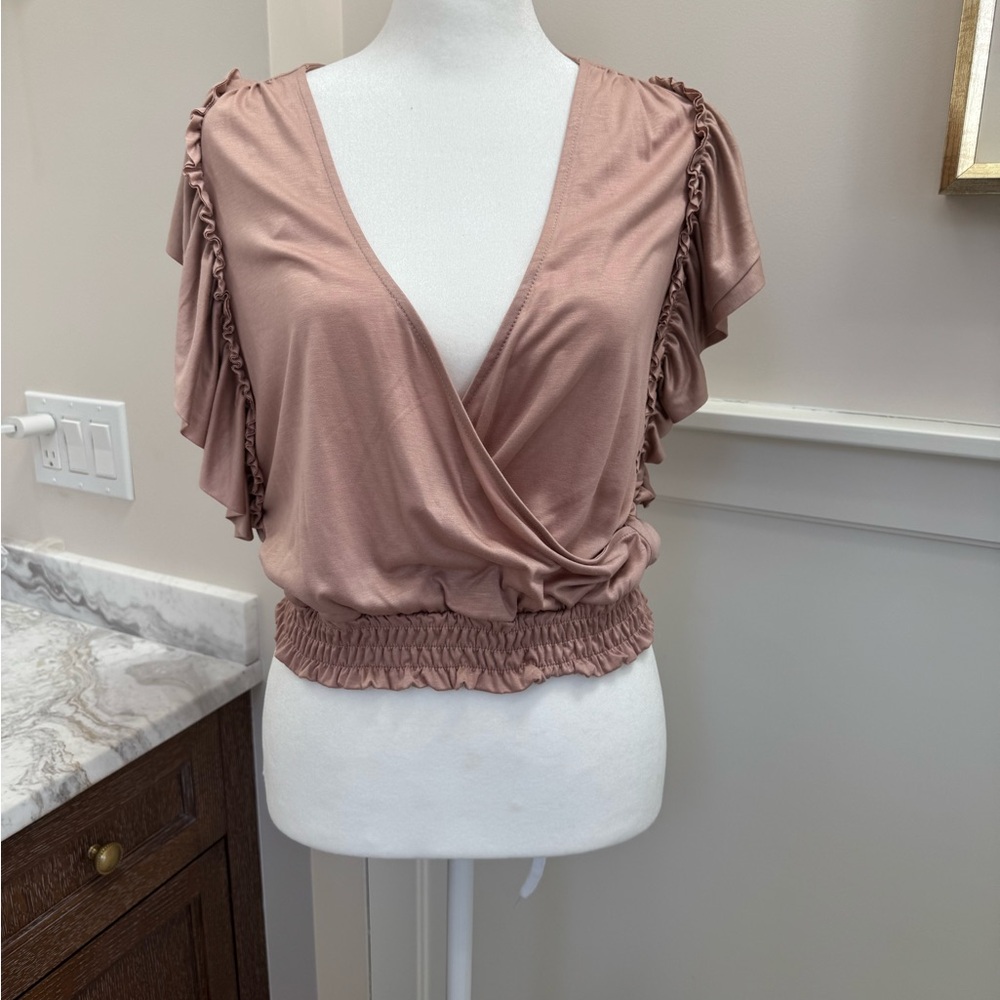 Ladies Anthropologiebeautiful rose colored sleeveless top V neck , size Small
